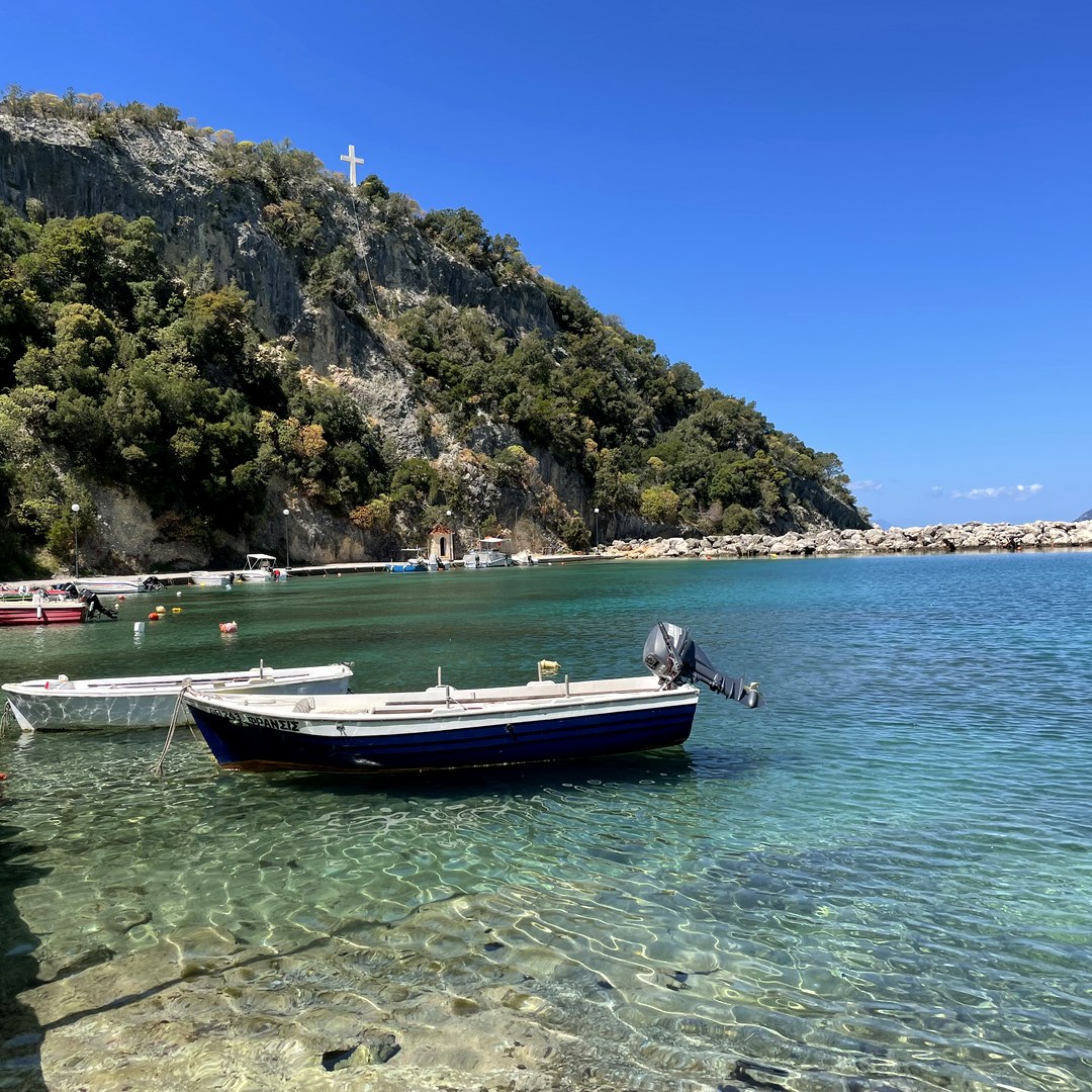 Harbour with cross on the rock