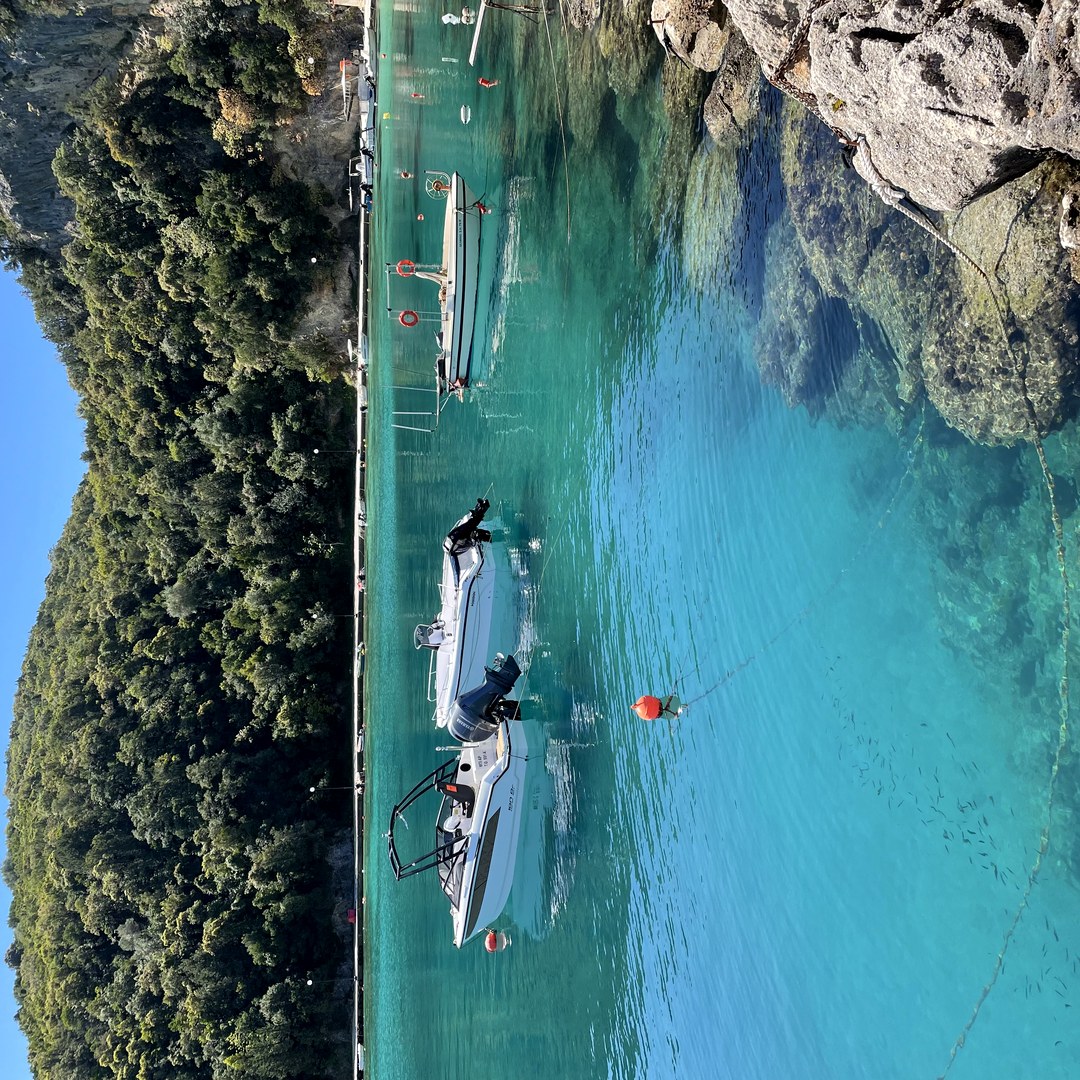 Boats in turquoise harbour